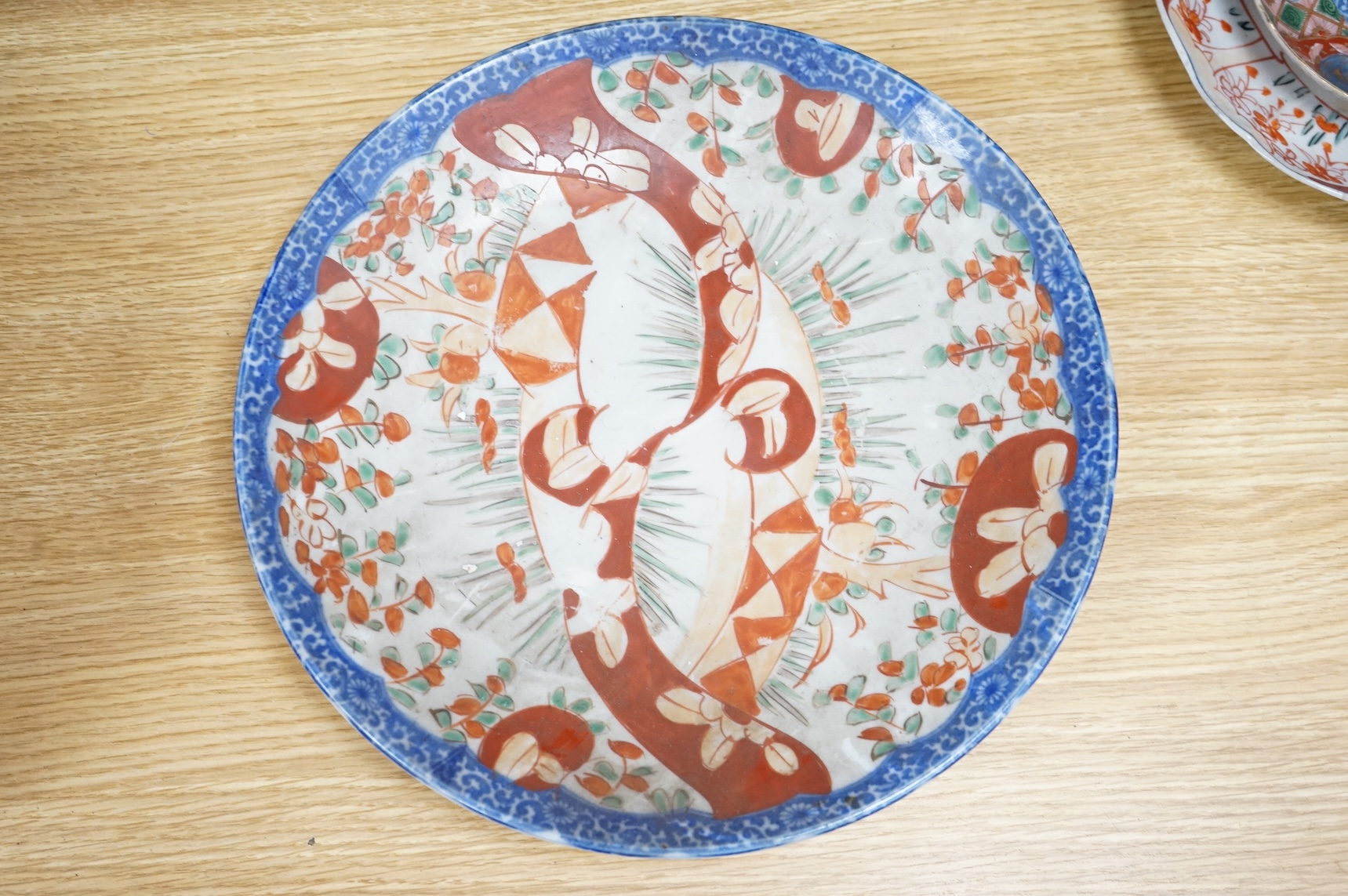 Three Japanese Imari dishes, largest 30.5cm